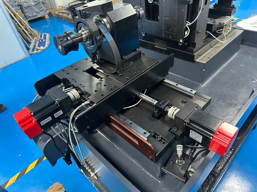 Precision machine mechanism under assembly